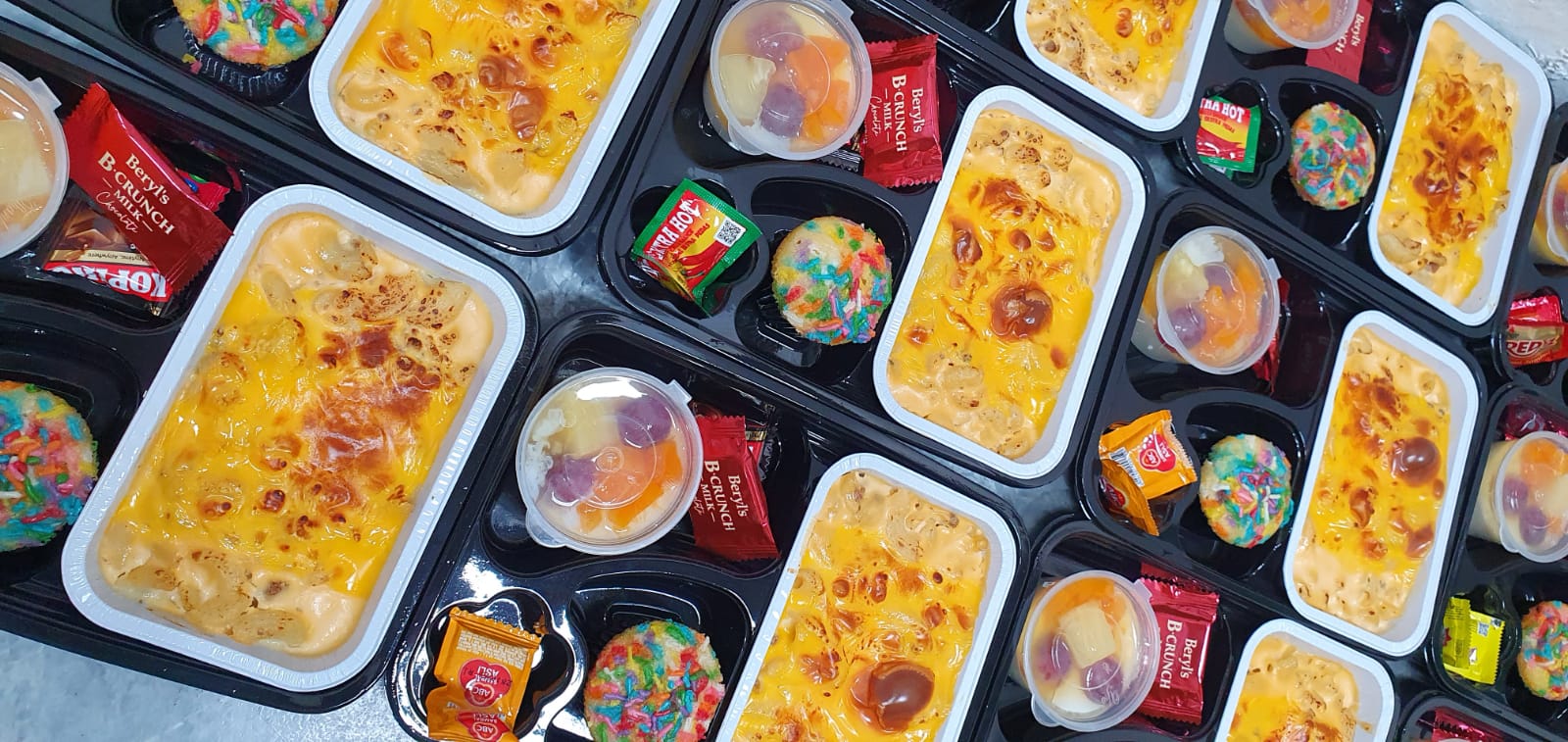 Premium snack box ( mac n cheese , cocktail puding, cupcakes )