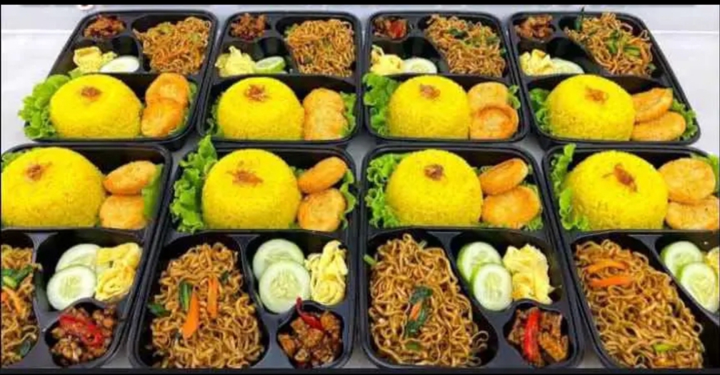Nasi kuning chiken nuget