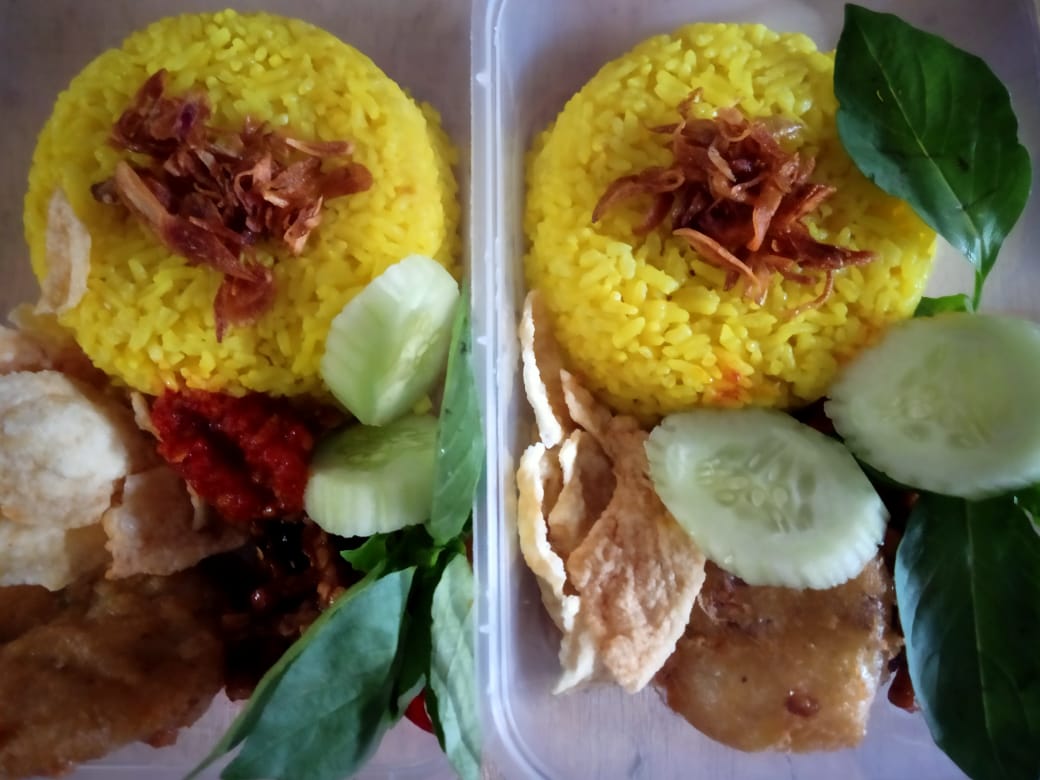 Nasi Kuning by Putra Putri