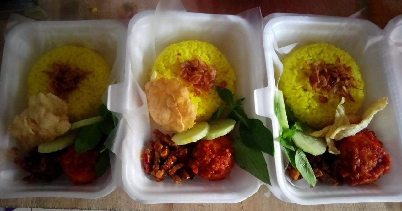 Nasi Kuning by Putra Putri